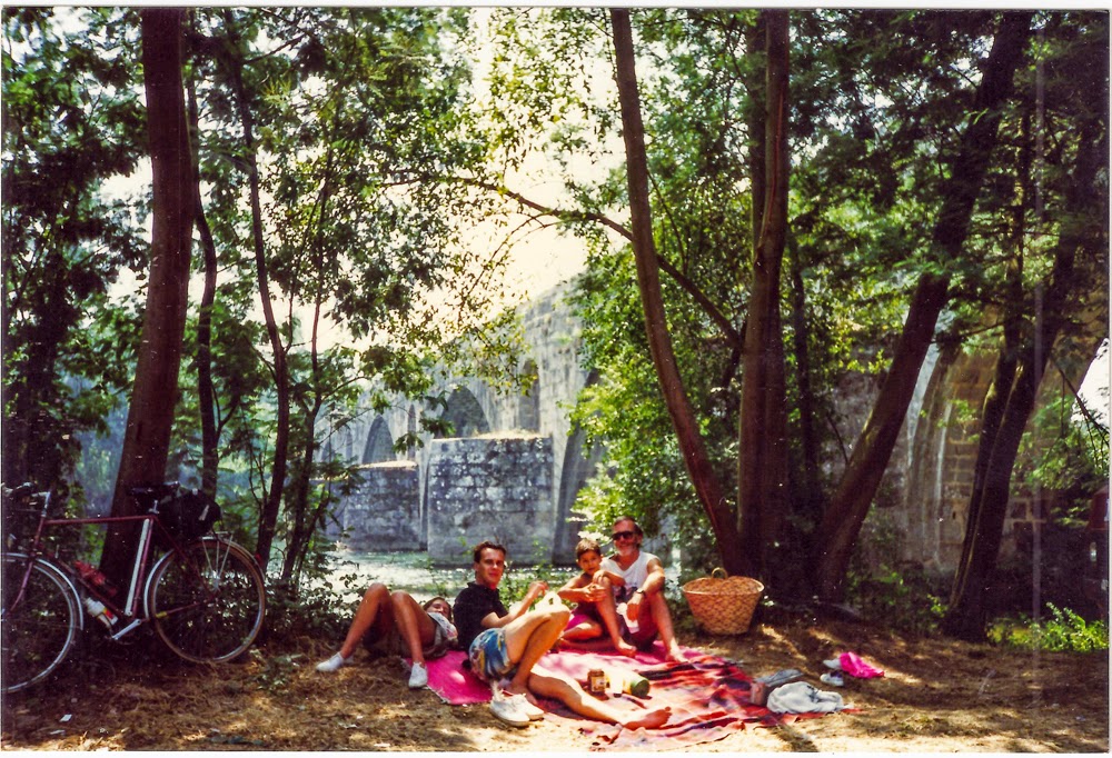 Picnic beside a river on the Minho bicycle tour in Portugal